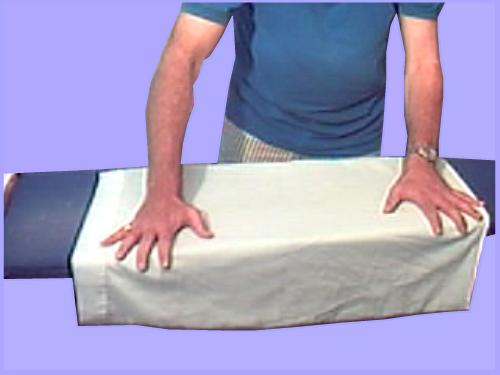 smoothing a pillow with your hands